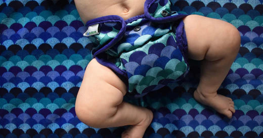 baby wearing overnight cloth diapers